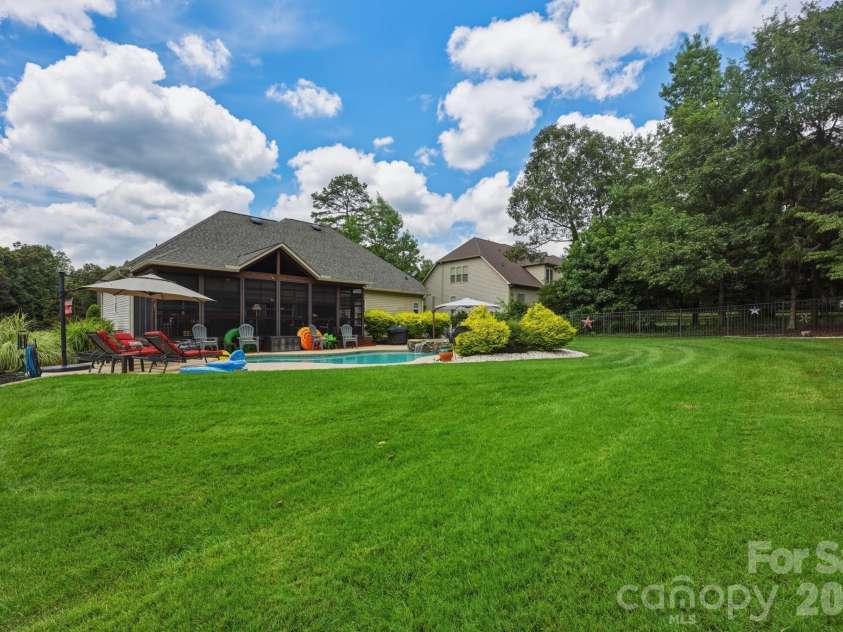 4659 Sagittarius Circle, Denver, NC 28037.  MLS# CAR4404495, YatesRealty ID 39306. Large Fenced Back Lawn and Pool Area