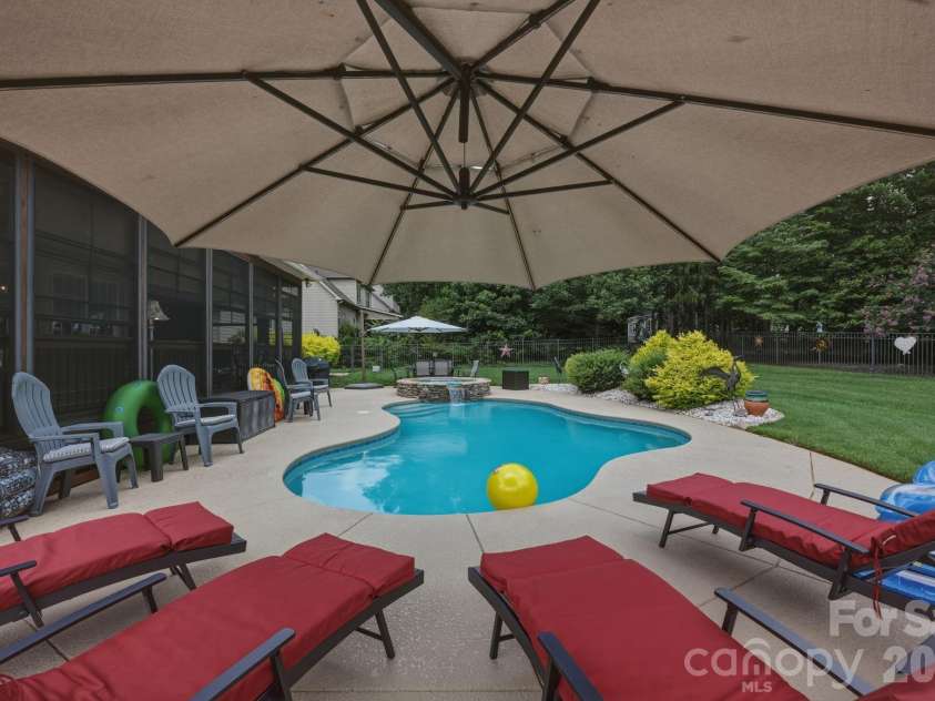 4659 Sagittarius Circle, Denver, NC 28037.  MLS# CAR4404495, YatesRealty ID 39306. Lounge Area by Pool
