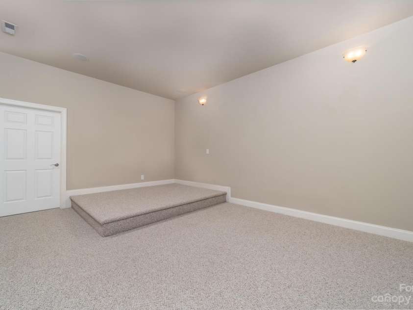 8065 Bay Pointe Drive, Denver, NC 28037.  MLS# CAR4101736, YatesRealty ID 3931. This room will be a great home theatre.
