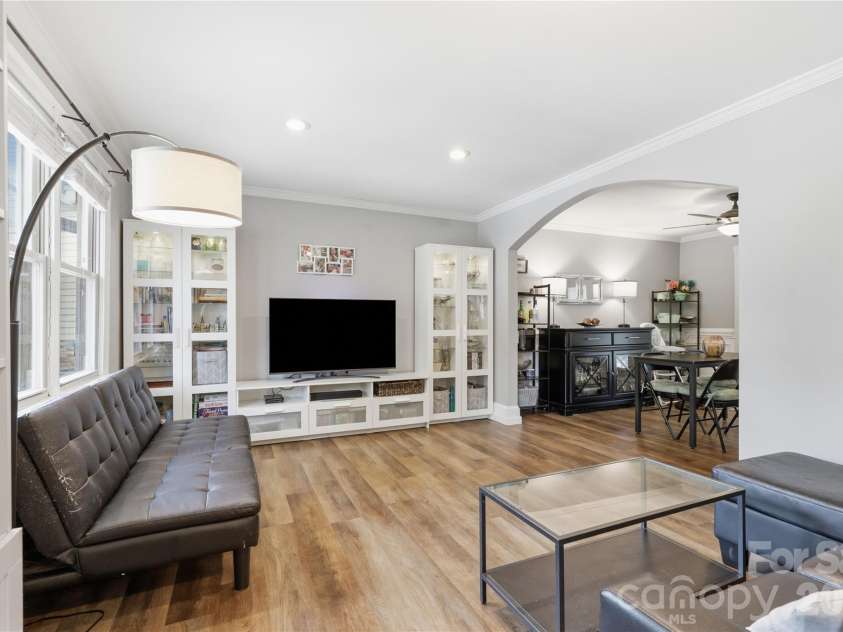 21013 Entrada Drive, Cornelius, NC 28031.  MLS# CAR4402041, YatesRealty ID 39320. Easy flow from the living room into the dining area.