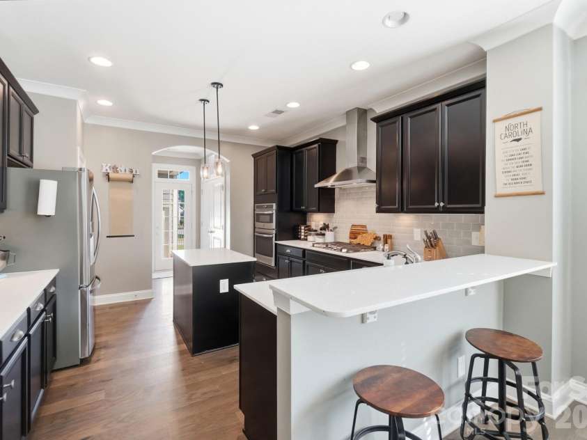 6217 Hove Road, Mint Hill, NC 28227.  MLS# CAR4401509, YatesRealty ID 39322. Kitchen with breakfast bar