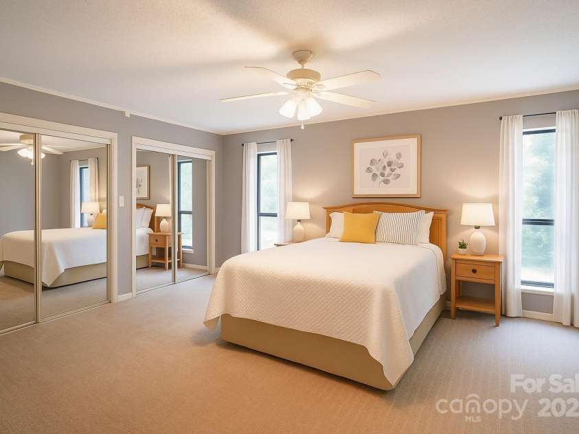 262 Rooster Cove, Brevard, NC 28712.  MLS# CAR4332799, YatesRealty ID 39326. Main level bedroom. Large his and hers closet. En suite bathroom. Virtually staged.