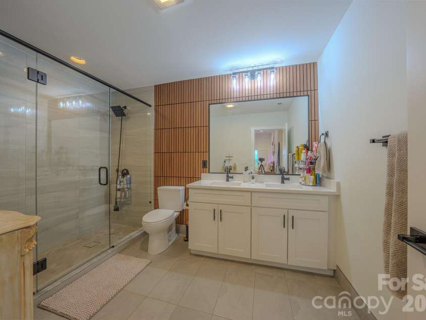 49 Arabella Lane, Arden, NC 28704.  MLS# CAR4402809, YatesRealty ID 39330. Lower Level Bath