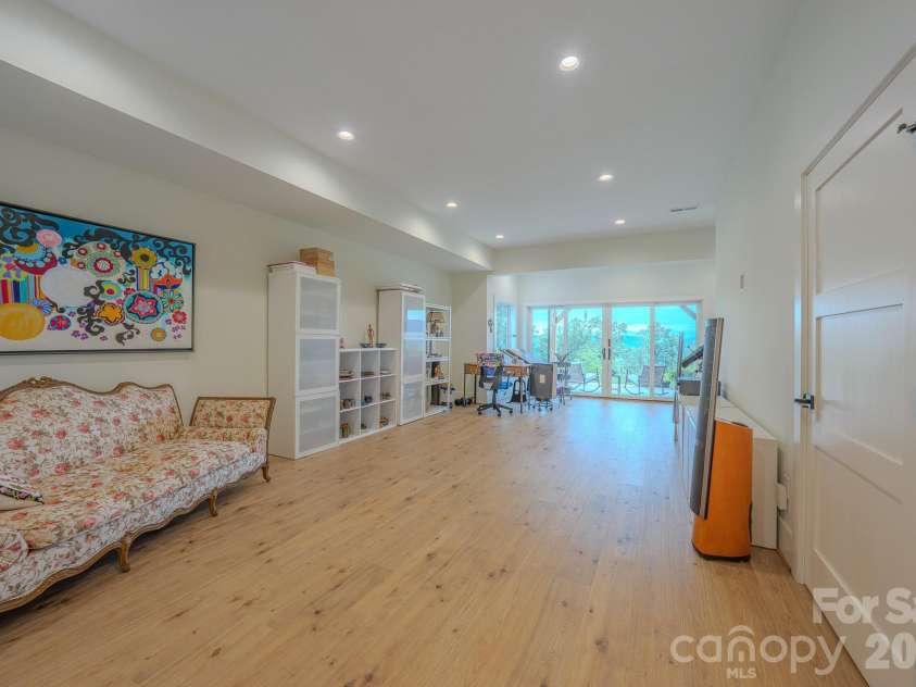 49 Arabella Lane, Arden, NC 28704.  MLS# CAR4402809, YatesRealty ID 39330. Lower Level Flex Room