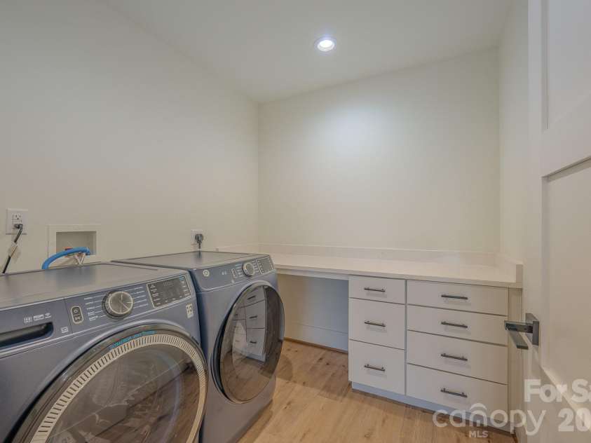 49 Arabella Lane, Arden, NC 28704.  MLS# CAR4402809, YatesRealty ID 39330. Lower Level Laundry