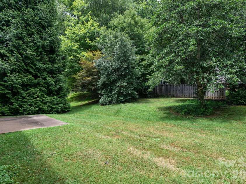 204 Windsor Forest Circle, Fletcher, NC 28732.  MLS# CAR4396269, YatesRealty ID 39335. Backyard