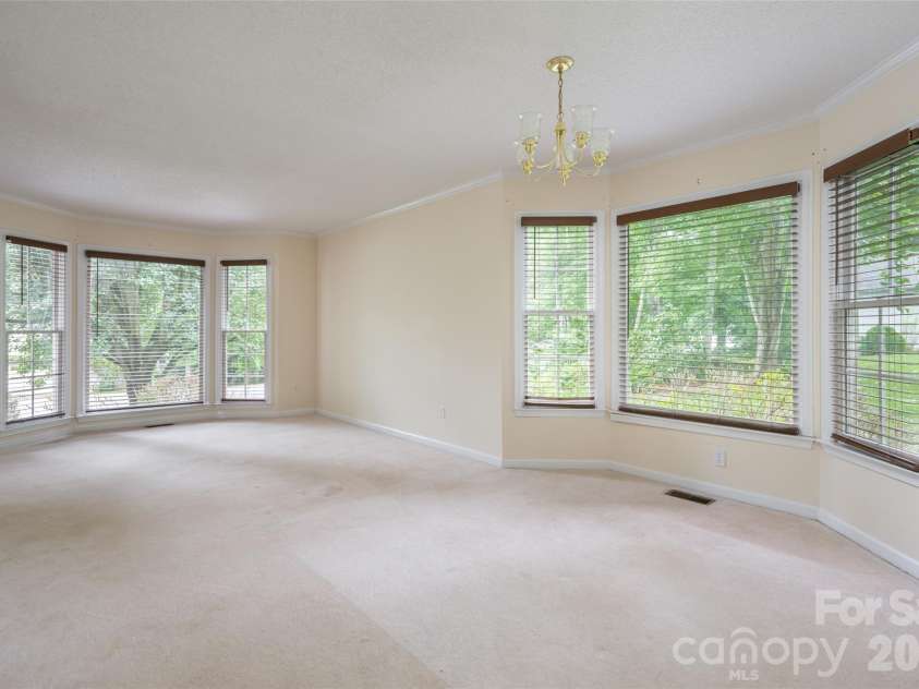 204 Windsor Forest Circle, Fletcher, NC 28732.  MLS# CAR4396269, YatesRealty ID 39335. Dining and Living