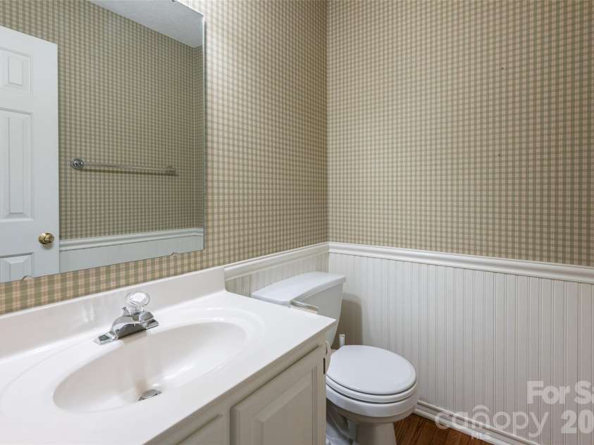 204 Windsor Forest Circle, Fletcher, NC 28732.  MLS# CAR4396269, YatesRealty ID 39335. Main Level Powder Room