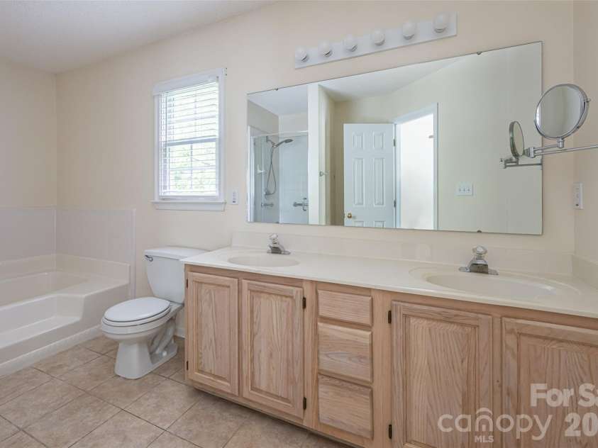 204 Windsor Forest Circle, Fletcher, NC 28732.  MLS# CAR4396269, YatesRealty ID 39335. Primary Bathroom
