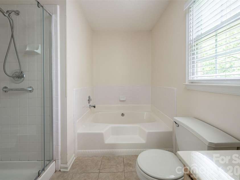 204 Windsor Forest Circle, Fletcher, NC 28732.  MLS# CAR4396269, YatesRealty ID 39335. Primary BAthroom