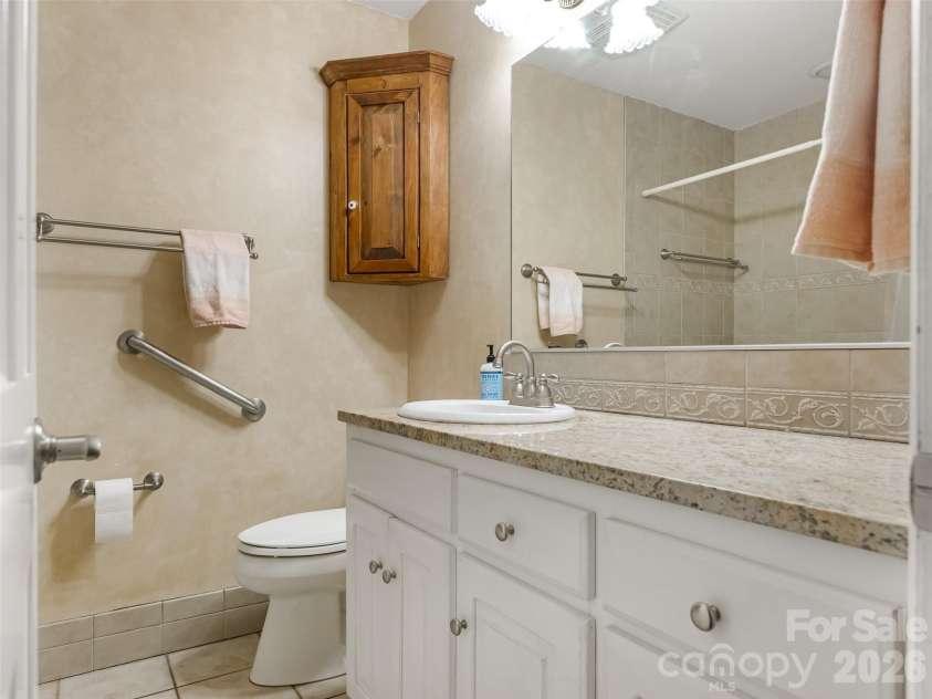 9476 Man O War Road, Fort Mill, SC 29707.  MLS# CAR4399848, YatesRealty ID 39336. Hall bathroom