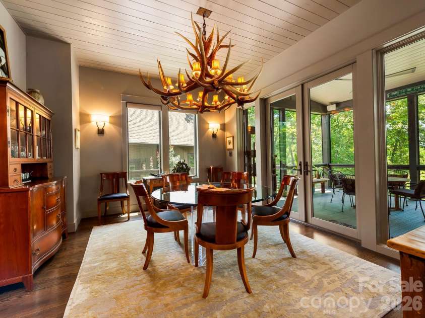 174 Dancing Wind Lane, Marshall, NC 28753.  MLS# CAR4402118, YatesRealty ID 39355. Access to the screened porch.