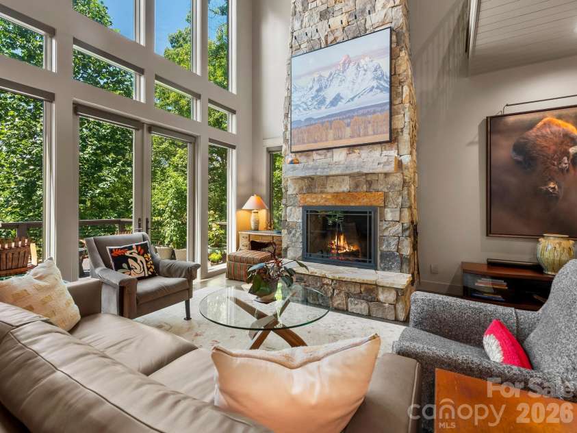 174 Dancing Wind Lane, Marshall, NC 28753.  MLS# CAR4402118, YatesRealty ID 39355. Cozy up to this beautiful wood-burning fireplace.