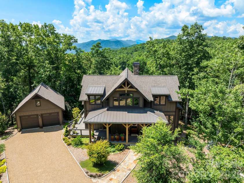 174 Dancing Wind Lane, Marshall, NC 28753.  MLS# CAR4402118, YatesRealty ID 39355. Enjoy living surrounded by trees and also enjoy a long-range mountain view!