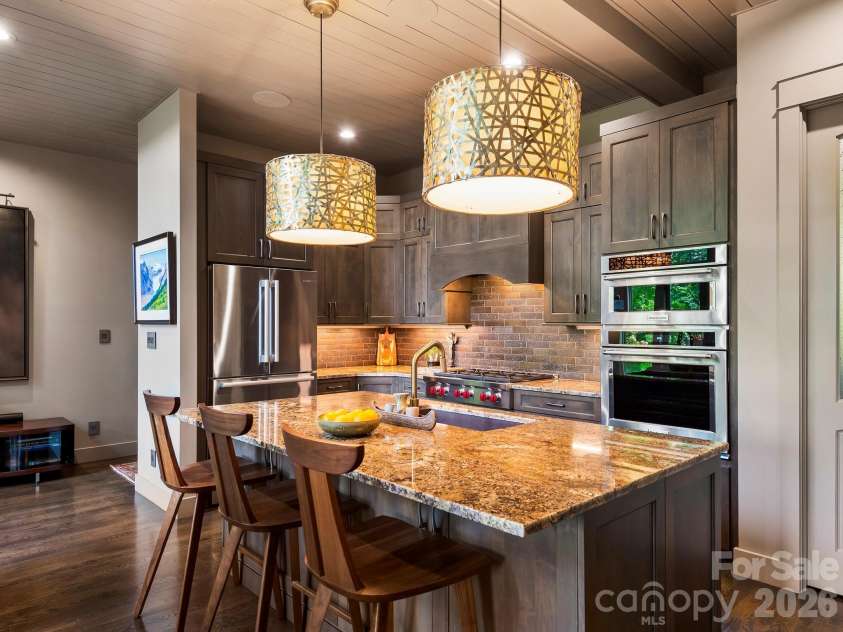 174 Dancing Wind Lane, Marshall, NC 28753.  MLS# CAR4402118, YatesRealty ID 39355. Kitchen Aid and Bosch appliances. The Bosch fridge has a VitaFresh drawer.