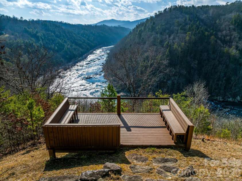 174 Dancing Wind Lane, Marshall, NC 28753.  MLS# CAR4402118, YatesRealty ID 39355. River Lodge river overlook.