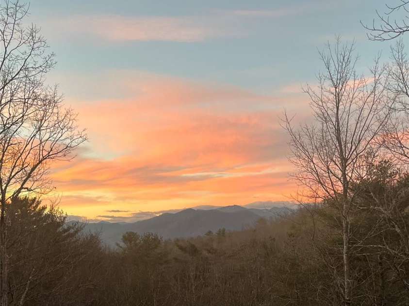 174 Dancing Wind Lane, Marshall, NC 28753.  MLS# CAR4402118, YatesRealty ID 39355. Sunset colors are an added bonus!