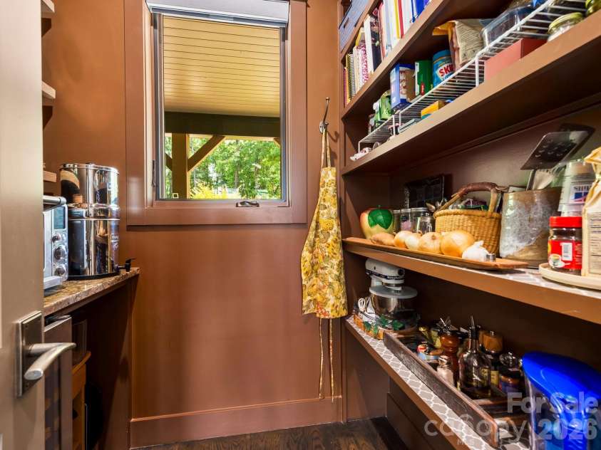 174 Dancing Wind Lane, Marshall, NC 28753.  MLS# CAR4402118, YatesRealty ID 39355. Walk-in pantry with beverage fridge and ample storage.