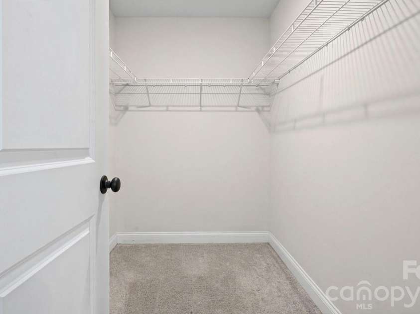 5960 Charlie Walker Road, Kannapolis, NC 28081.  MLS# CAR4406735, YatesRealty ID 39381. Primary walk-in closet
