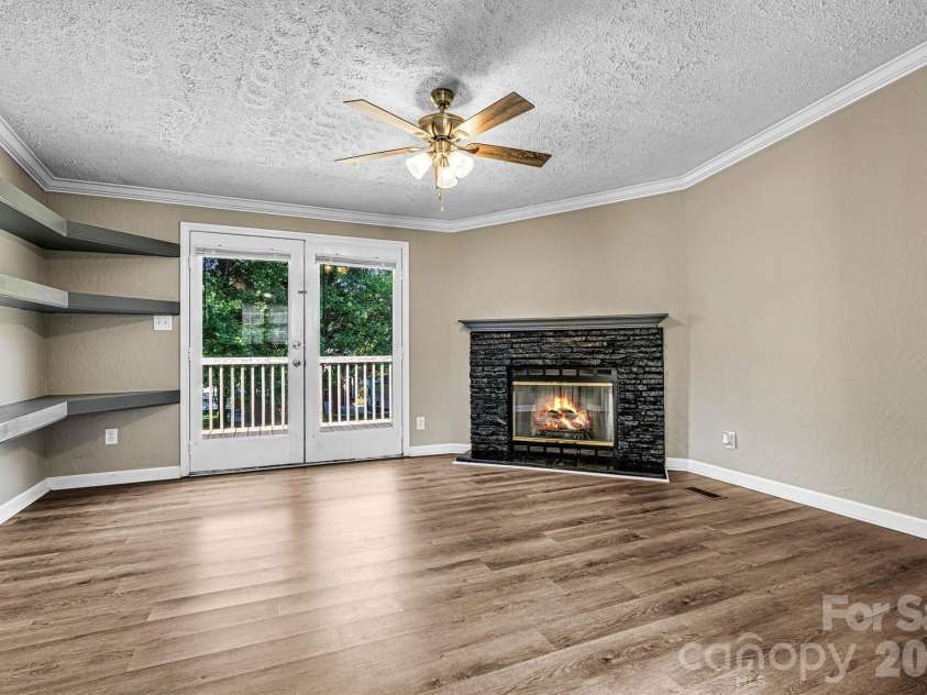 5135 36th Street Drive, Hickory, NC 28601.  MLS# CAR4406637, YatesRealty ID 39399. Den/Fireplace & Back Deck Entry View