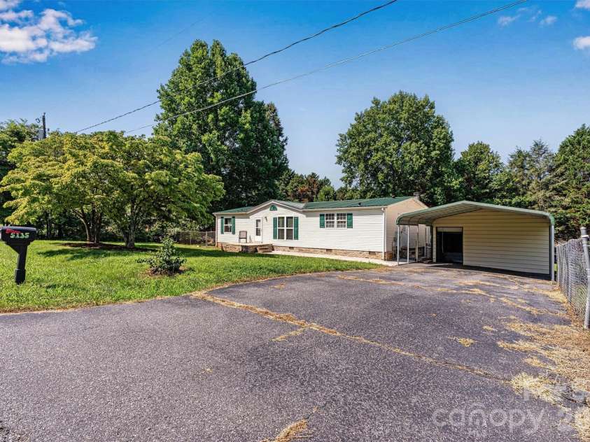 5135 36th Street Drive, Hickory, NC 28601.  MLS# CAR4406637, YatesRealty ID 39399. Focused Canopy Parking View/Storage Entry View