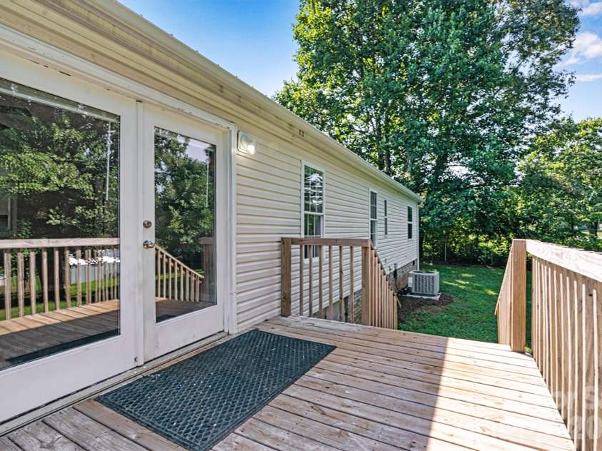 5135 36th Street Drive, Hickory, NC 28601.  MLS# CAR4406637, YatesRealty ID 39399. Focused Deck/Back Entry View