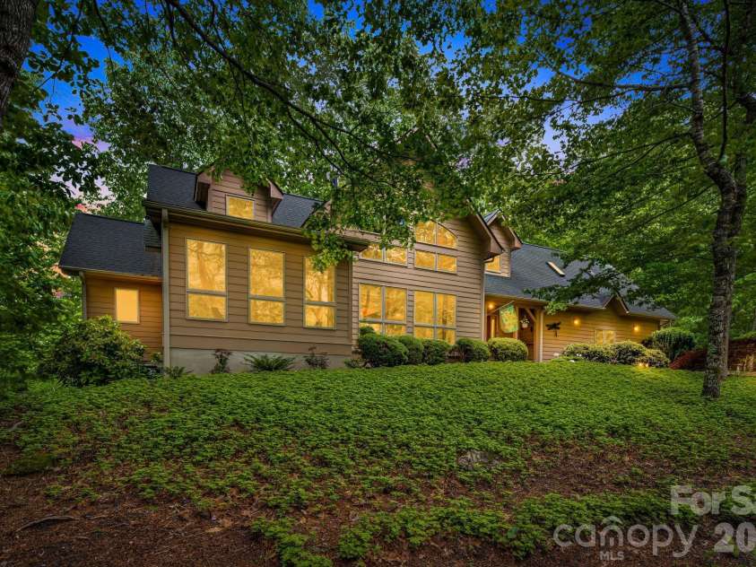 5584 Spring Road, Hendersonville, NC 28739.  MLS# CAR4350569, YatesRealty ID 3940. Front view - Twilight