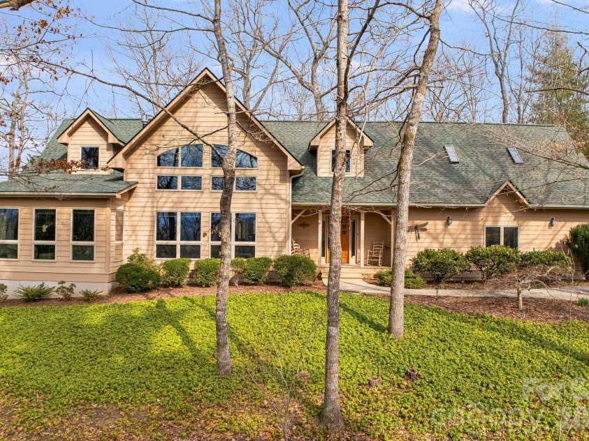 5584 Spring Road, Hendersonville, NC 28739.  MLS# CAR4350569, YatesRealty ID 3940. Front view - Winter