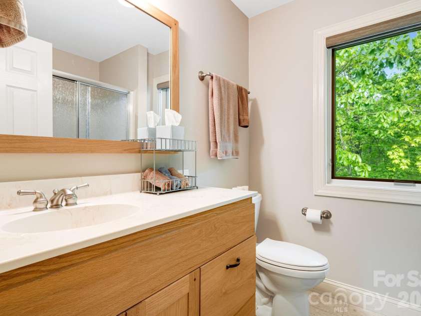 5584 Spring Road, Hendersonville, NC 28739.  MLS# CAR4350569, YatesRealty ID 3940. Guest bath 1