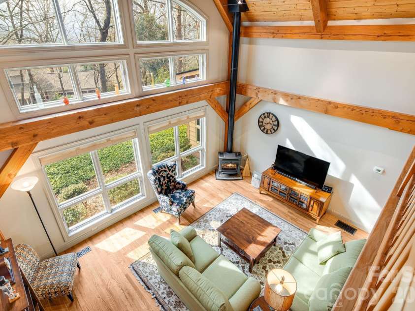 5584 Spring Road, Hendersonville, NC 28739.  MLS# CAR4350569, YatesRealty ID 3940. Second level loft area with winter view.