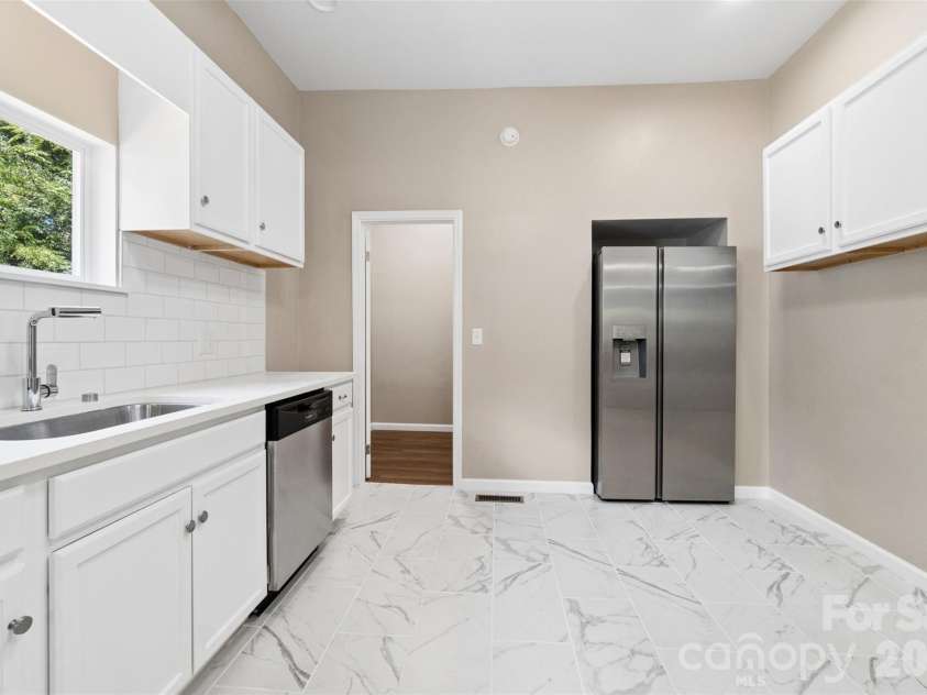 607 Lee Avenue, Wadesboro, NC 28170.  MLS# CAR4405753, YatesRealty ID 39406. Kitchen with Pantry