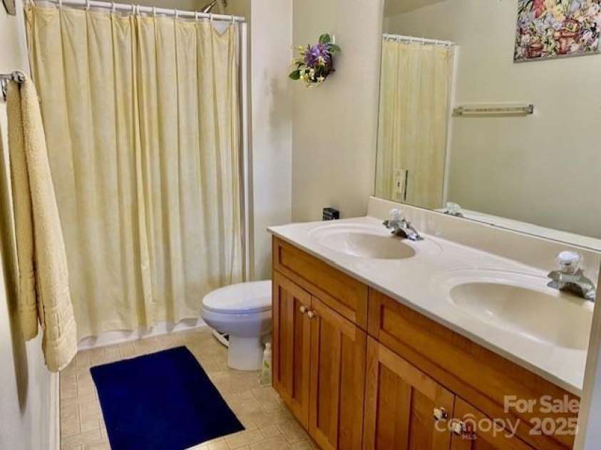 186 Stonecrest Court, Lake Lure, NC 28746.  MLS# CAR4270856, YatesRealty ID 3942. En suite bathroom with walk in shower