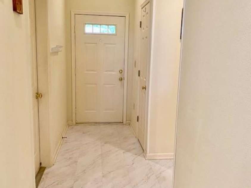 186 Stonecrest Court, Lake Lure, NC 28746.  MLS# CAR4270856, YatesRealty ID 3942. Entrance way with coat closet