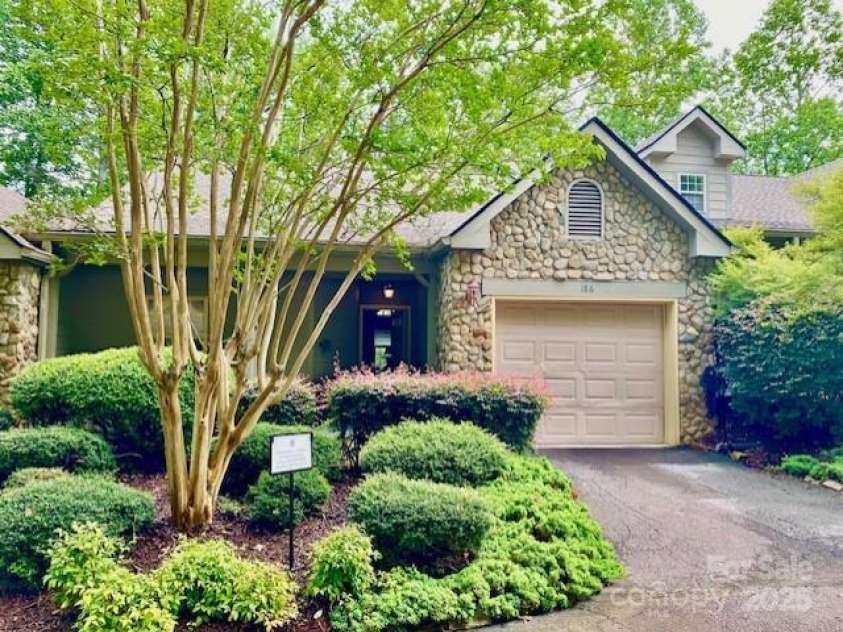 186 Stonecrest Court, Lake Lure, NC 28746.  MLS# CAR4270856, YatesRealty ID 3942. Top Level with attached garage beautiful stone work