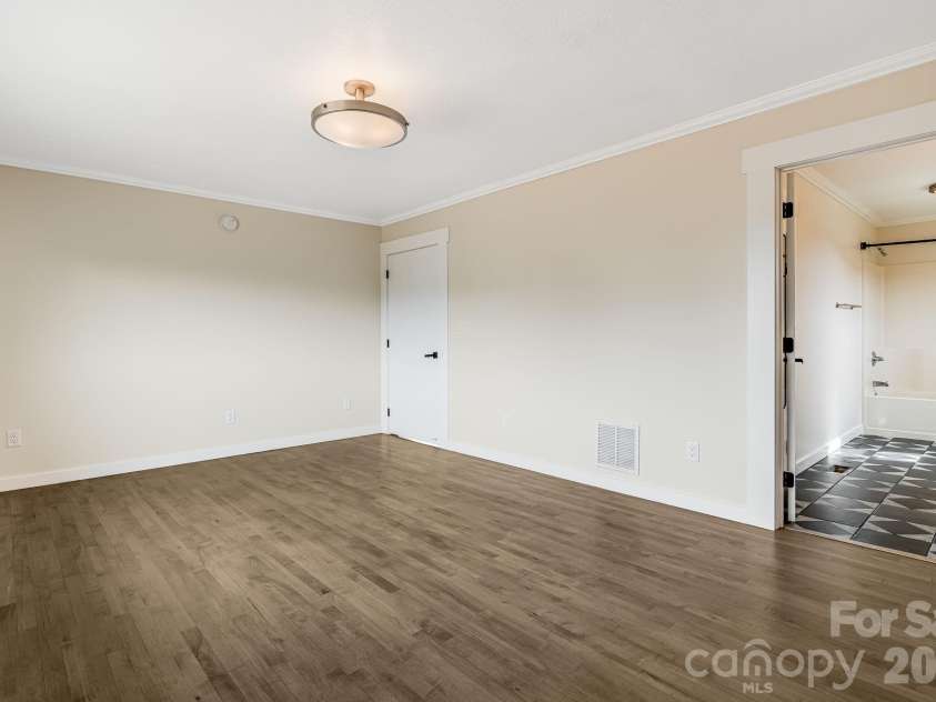 76 Murray Debruhl Road, Alexander, NC 28701.  MLS# CAR4345165, YatesRealty ID 3942. Main level bedroom 1