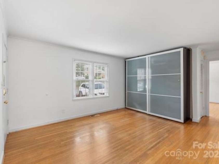 918 McAlway Road, Charlotte, NC 28211.  MLS# CAR4298989, YatesRealty ID 39426. Living room with storage