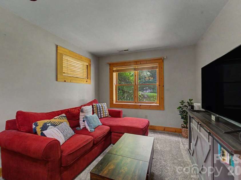 91 Tibi Lane, Waynesville, NC 28785.  MLS# CAR4405996, YatesRealty ID 39433. Downstairs studio apartment