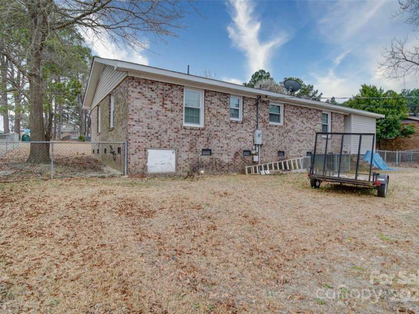 102 Wilshire Avenue, Hamlet, NC 28345.  MLS# CAR4232474, YatesRealty ID 3944. Back of house