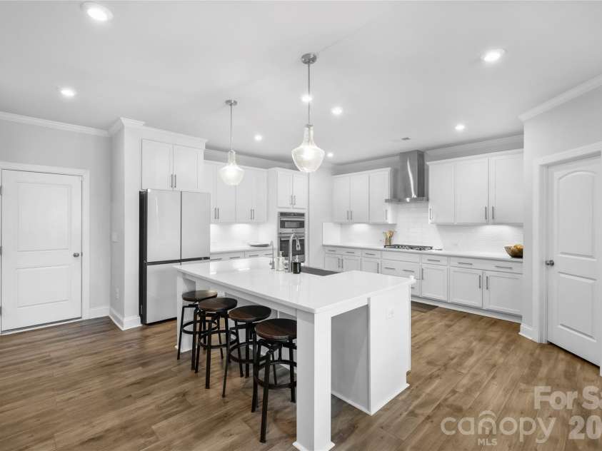 1402 Ashe Meadow Drive, Indian Trail, NC 28079.  MLS# CAR4403555, YatesRealty ID 3944. A kitchen designed for conversation.