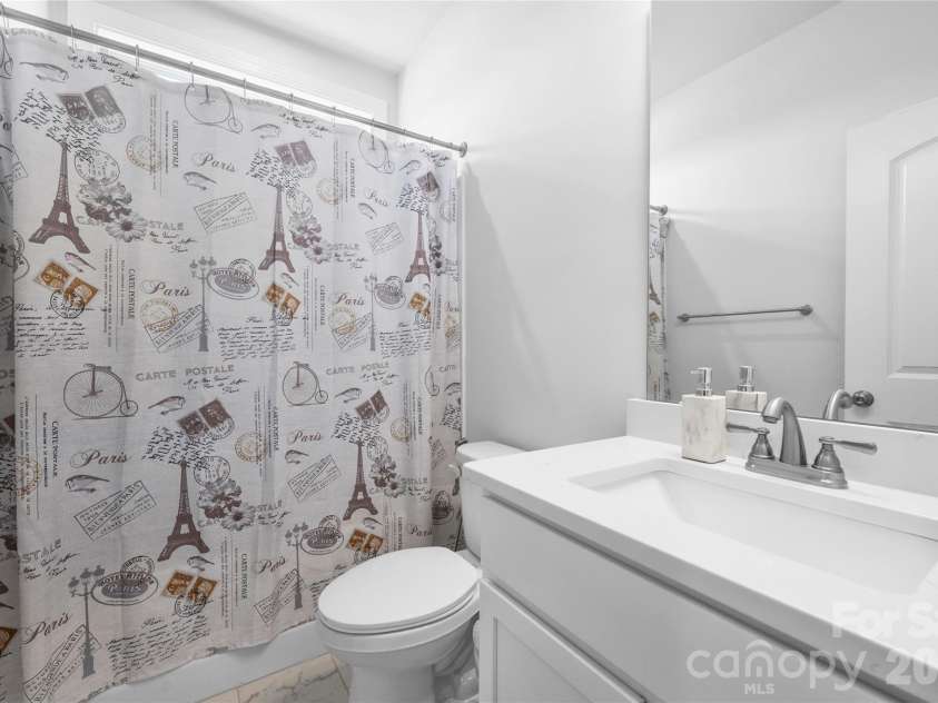 1402 Ashe Meadow Drive, Indian Trail, NC 28079.  MLS# CAR4403555, YatesRealty ID 3944. Well-appointed secondary bath.