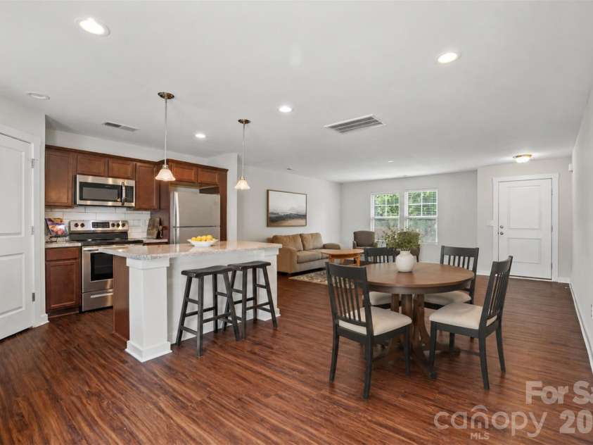 105 Beam Drive, Mooresville, NC 28115.  MLS# CAR4404578, YatesRealty ID 39454. Breakfast area (staged)- Open floorplan