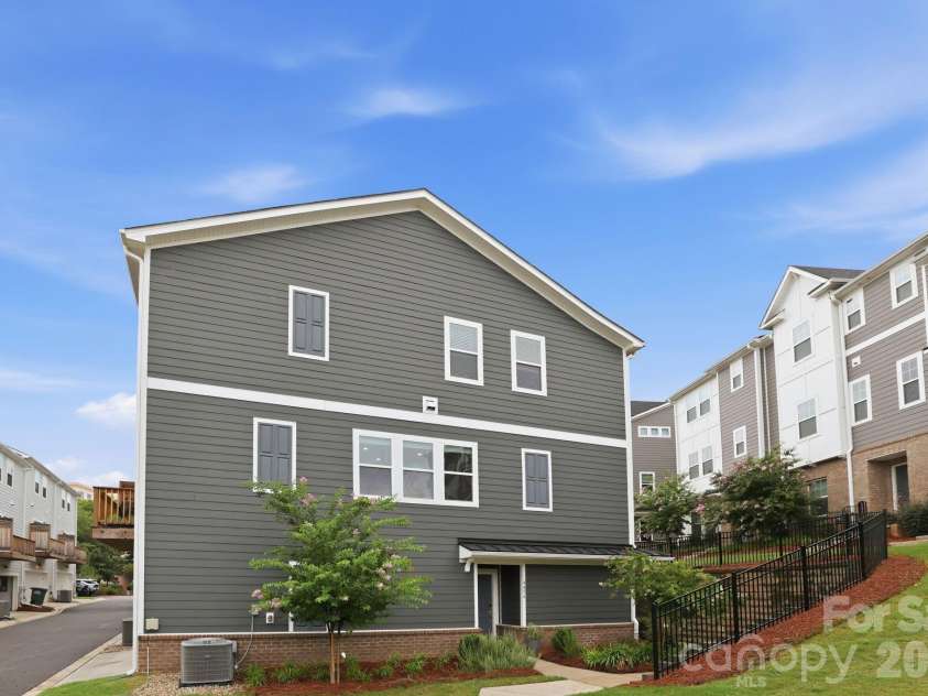 4456 Millennium Avenue, Charlotte, NC 28217.  MLS# CAR4404262, YatesRealty ID 39463. End unit entrance