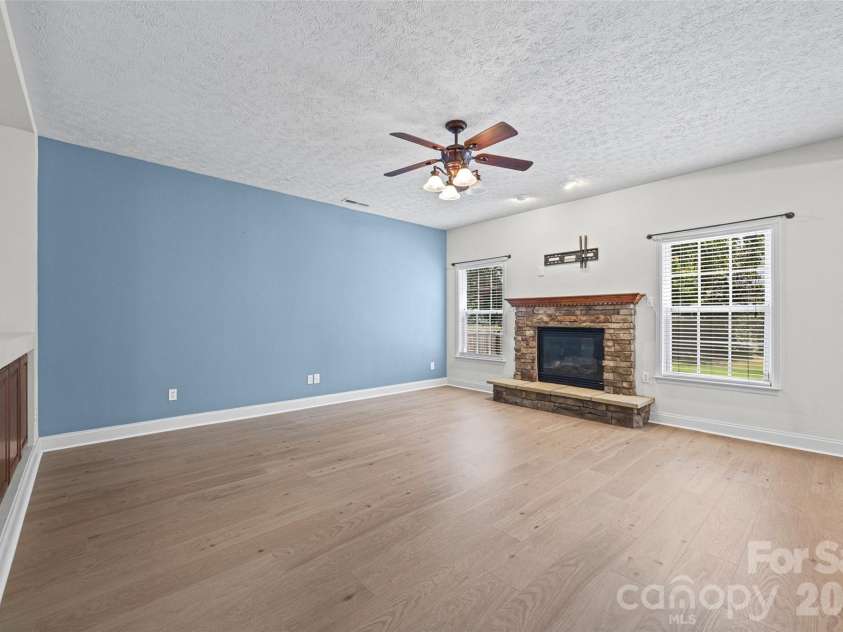 3990 Long Leaf Court, Concord, NC 28025.  MLS# CAR4406364, YatesRealty ID 39465. With an inviting fireplace
