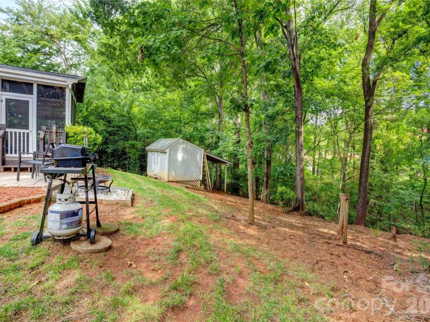3688 Lake Spring Avenue, Concord, NC 28027.  MLS# CAR4406214, YatesRealty ID 39472. Private back yard