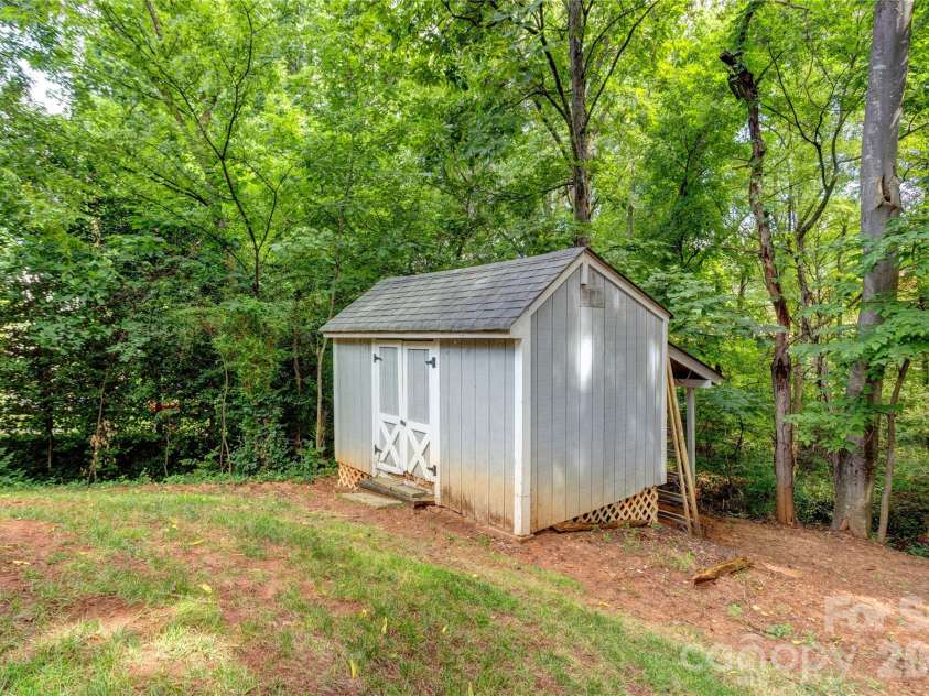 3688 Lake Spring Avenue, Concord, NC 28027.  MLS# CAR4406214, YatesRealty ID 39472. Storage building