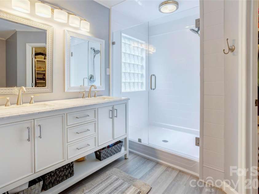 3688 Lake Spring Avenue, Concord, NC 28027.  MLS# CAR4406214, YatesRealty ID 39472. Updated primary bath with double vanity and step in shower