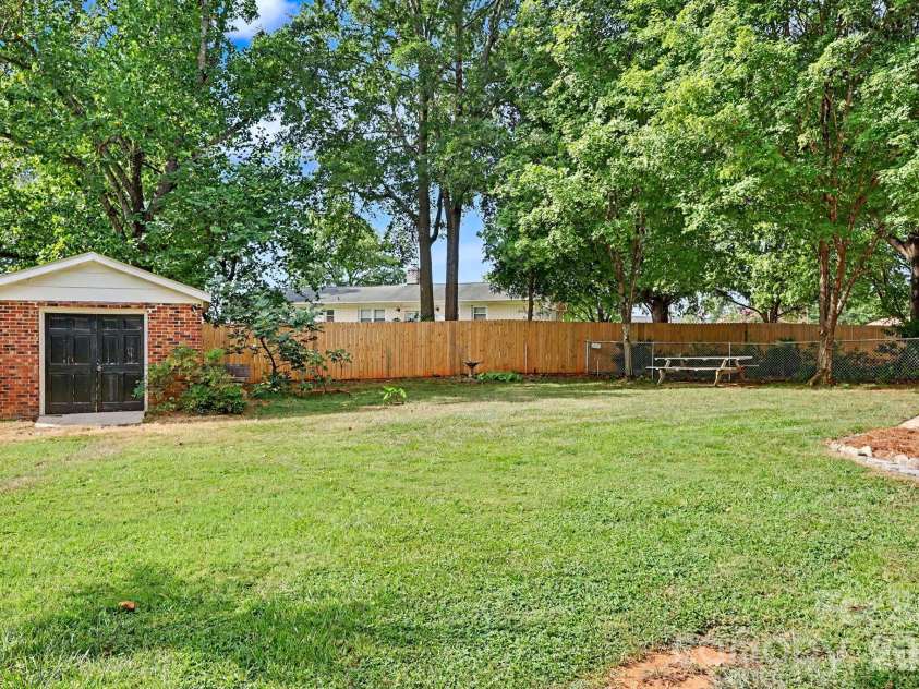 425 Valhalla Drive, Harrisburg, NC 28075.  MLS# CAR4405585, YatesRealty ID 39474. Backyard/Shed
