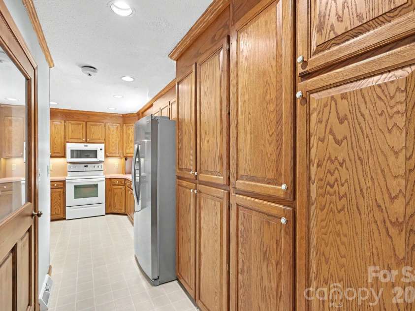 425 Valhalla Drive, Harrisburg, NC 28075.  MLS# CAR4405585, YatesRealty ID 39474. Kitchen Storage