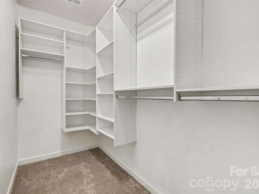 2400 River Oaks Drive, Waxhaw, NC 28173.  MLS# CAR4405322, YatesRealty ID 39481. Master closet