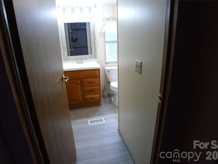 116 Hank Lesser Road, Mocksville, NC 27028.  MLS# CAR4406699, YatesRealty ID 39483. Bathroom